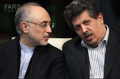 آقازاده ی معروف در کنار وزیر احمدی نژاد عکس