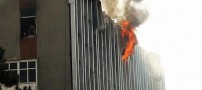 تصاویر تکان‌ دهنده سقوط این زن از ساختمان آتش گرفته