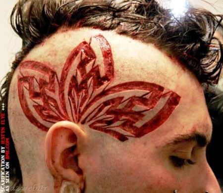 18+ خالکوبی های گوشتی و وحشتاک شیطان پرستان (تصویری)