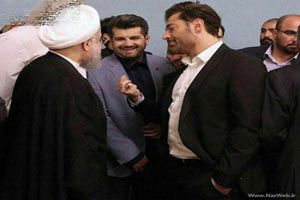ژست جنجالی رضا گلزار مقابل حسن روحانی (عکس)