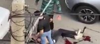 فیلم دعوای وحشتناک ارازل با قمه بر سر یک زن در میدان ونک