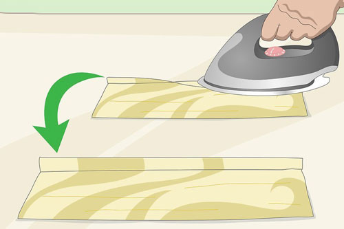 اتو کشی قسمت های برش و دوخت شده کلاه