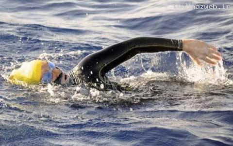 عکس های اولین زن شناگر بدون قفس محافظ !