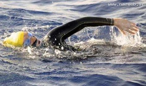 عکسهای رکوردزنی اولین زن شناگر بدون قفس محافظ