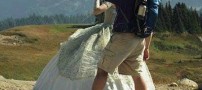 زنی با انگیزه جالب و لباس عجیب برای کوهنوردی